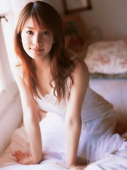 Enchanting babe Junko Yaginuma looks incredible in a white dress