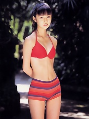 Cute petite asian babe allurs and intices in her red bikini